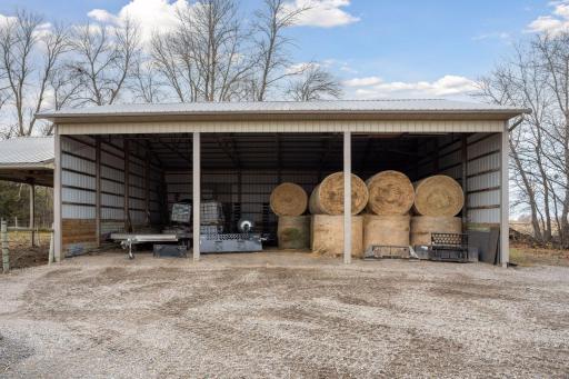 The shed features a large attached run-through, conveniently accessible from the pasture to the south.