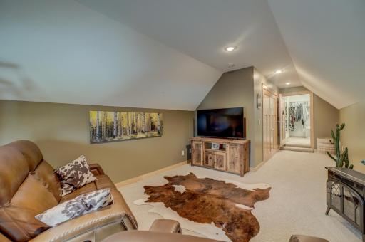 The bonus living space above the garage offers endless versatility-perfect for work, play, or guests.