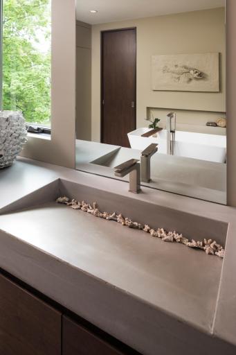 Primary bathroom with poured concrete sinks