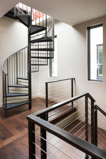 Spiral staircase leading to rooftop terrace