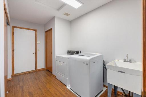 Nice laundry room with a utility sink