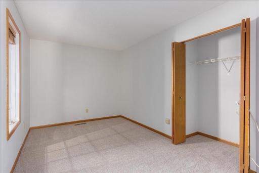 2nd bedroom with new carpet and fresh paint!