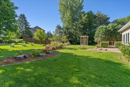 Such a nice backyard and flower gardens!