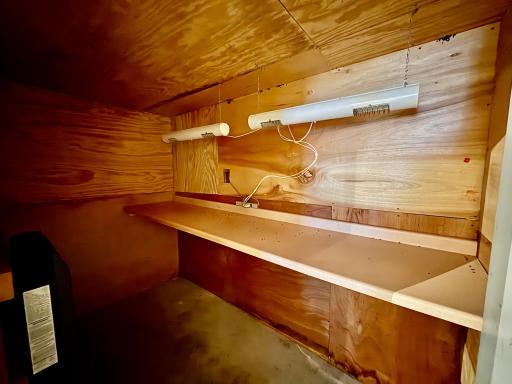 Insulated/heated fish cleaning room in shop