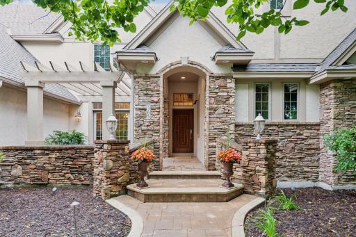 Welcome to your Forever home in Wayzata schools on Medina Golf Country Club in Desired Wild Meadows