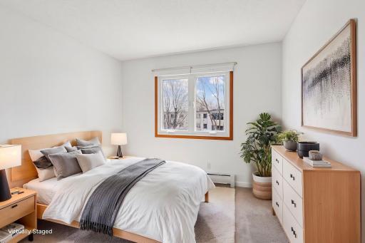 A comfortably sized second bedroom features calming neutral tones! *Virtually staged to show design options.