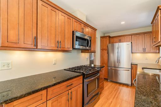 Updated kitchen with stainless steel appliances throughout