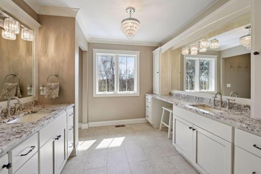 Master Bathroom with double sinks and storage