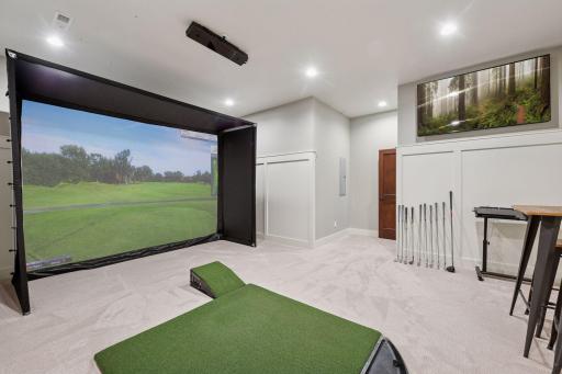Renovated sport court into golf simulator