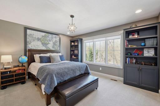 Bedroom 2 with built in bookcases and desk
