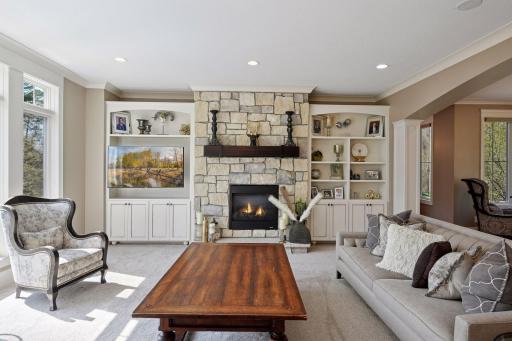 Living area with enameled shelves and storage.