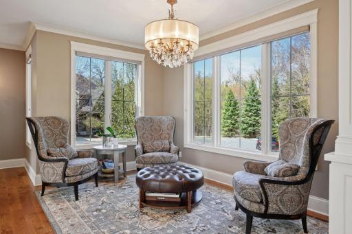 Quaint sitting area of a place for a future piano