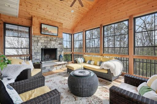 New 3 1/2 season windows and screened porch with gas fireplace
