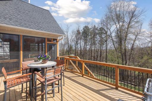 Porch leads to large open deck for room to entertain