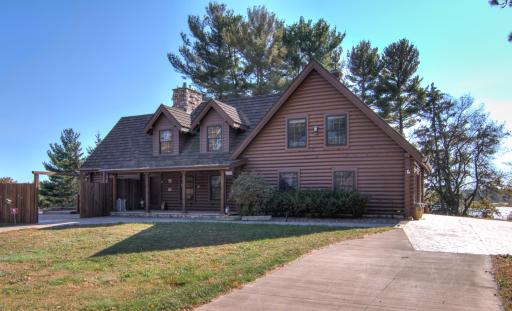 INCREDIBLE Upper Tainter (6) BR fully furnished log home situated on a private 7.5 acre campus w/778 ft. of water frontage!