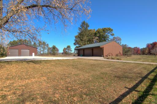 48x56 pole building (on left) & 26x36 detached 2 car garage (on right)