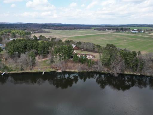 Did we mention 778' of water frontage on Upper Tainter! This is a very special and unique property with the amount of water frontage, acreage, outbuilding capacity and move in ready home!