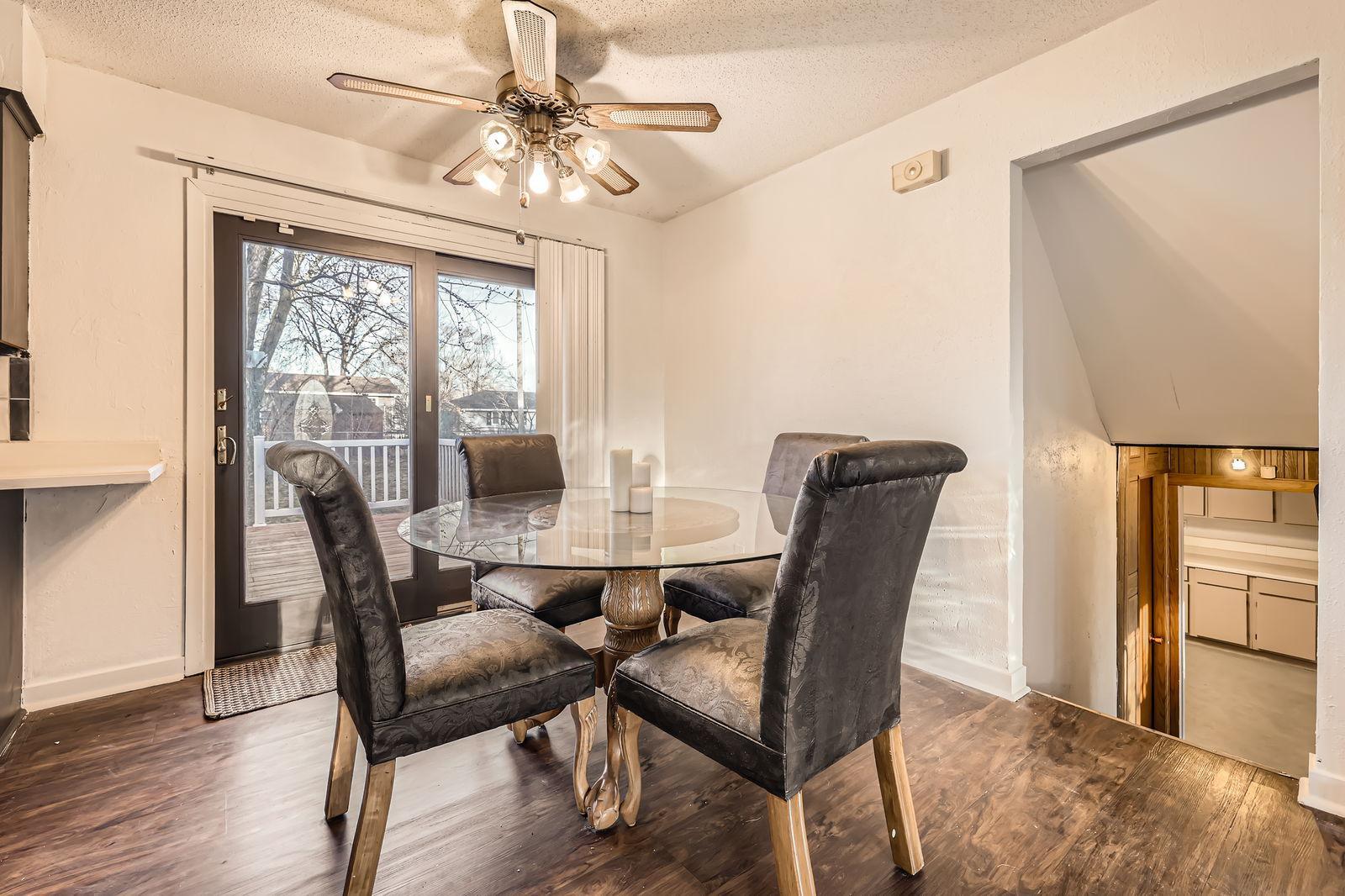 Dining room is open to the living room and just off the deck