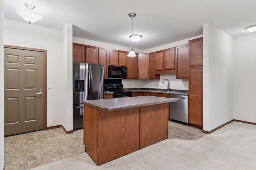 Kitchen is located off the entry to this unit.