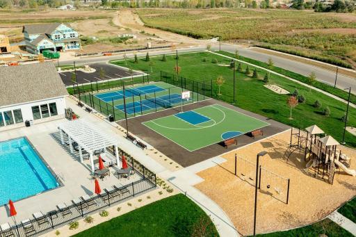 The clubhouse features a pool, fitness center, yoga studio, locker rooms, 2 pickleball courts, a basketball court, a playground, and lots of green space!