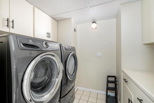 View of the laundry room and walk in pantry off of the kitchen