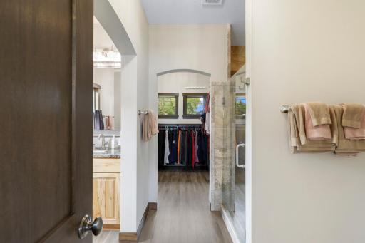 The primary ensuite is generously sized with a walk-in shower, dual vanities and a massive walk-in closet.