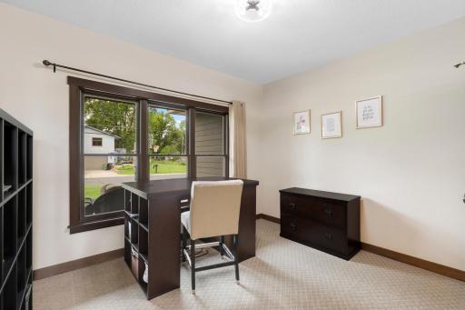 The 2nd of 4 bedrooms is also located on the main floor and can be utilized as a flex space.