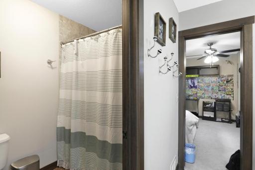 The 2 kidsâ rooms on the lower level are served by a jack and jill bathroom with dual vanities and a separate shower/toilet room.