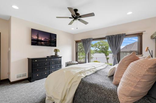 The primary ensuite is generously sized with a walk-in shower, dual vanities and a massive walk-in closet.