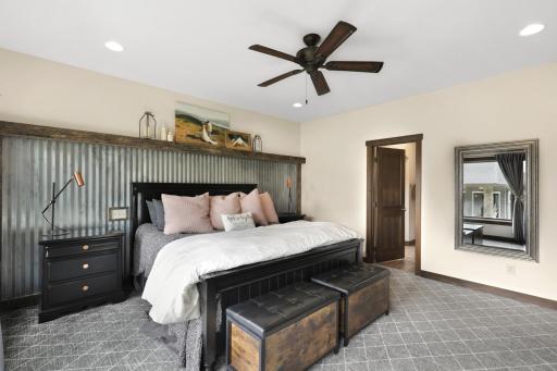 The primary ensuite is generously sized with a walk-in shower, dual vanities and a massive walk-in closet.