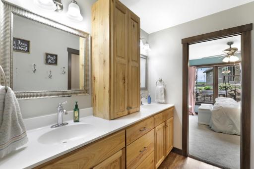 The 2 kidsâ rooms on the lower level are served by a jack and jill bathroom with dual vanities and a separate shower/toilet room.