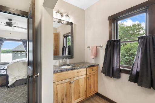 The primary ensuite is generously sized with a walk-in shower, dual vanities and a massive walk-in closet.