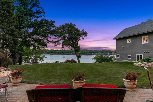 The current owners invested over $280K to optimize the useability of the outdoor space including enlargement of the primary driveway, improving the area leading to front entry, adding a garden, boulder retaining walls, a hot tub & gazebo.