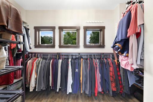 The primary ensuite is generously sized with a walk-in shower, dual vanities and a massive walk-in closet.