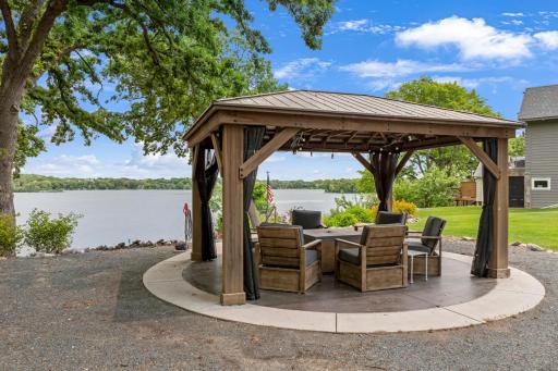 The gazebo area is connected to water, and it was designed to accommodate a more substantial structure such as a future boathouse style building.