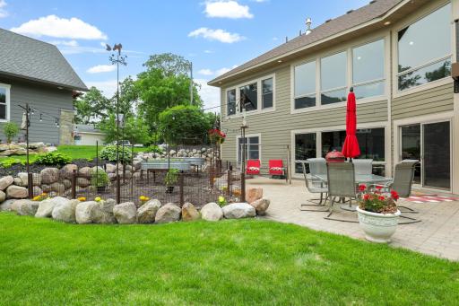 The current owners invested significant capital to optimize the useability of the outdoor space including enlargement of the primary driveway, improving the area leading to front entry, adding a garden, boulder retaining walls, a hot tub & gazebo.