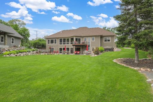 The 2/3 of an acre, pristinely landscaped and mostly flat lot features 87 feet of waterfront on Lake Johanna.