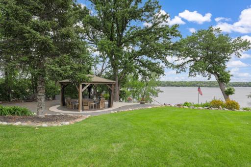 The gazebo area is connected to water, and it was designed to accommodate a more substantial structure such as a future boathouse style building.
