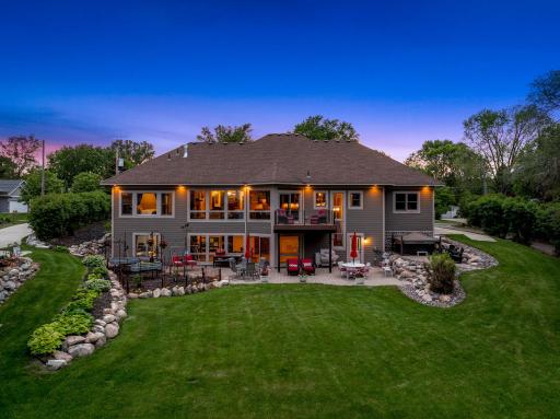 The current owners invested significant capital to optimize the useability of the outdoor space including enlargement of the primary driveway, improving the area leading to front entry, adding a garden, boulder retaining walls, a hot tub & gazebo.