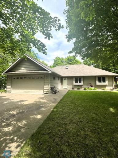 Sitting on 1-Acre; 2-Stall Attached Heated & Finished Garage