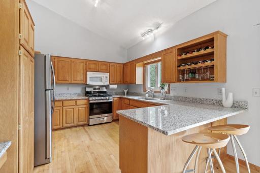 You'll love preparing meals in your updated kitchen with granite countertops and stainless steel appliances.