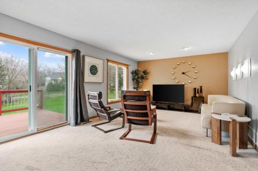 Easy access to the deck through the sliding glass door. New carpet in 2022.