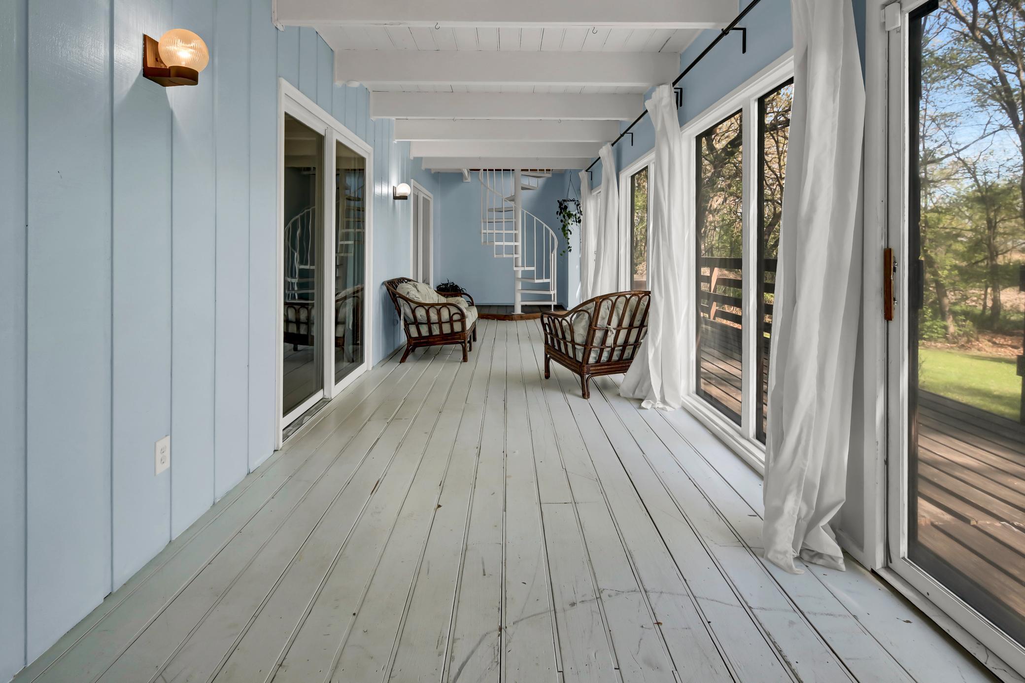 2 level sunroom with spiral staircase!