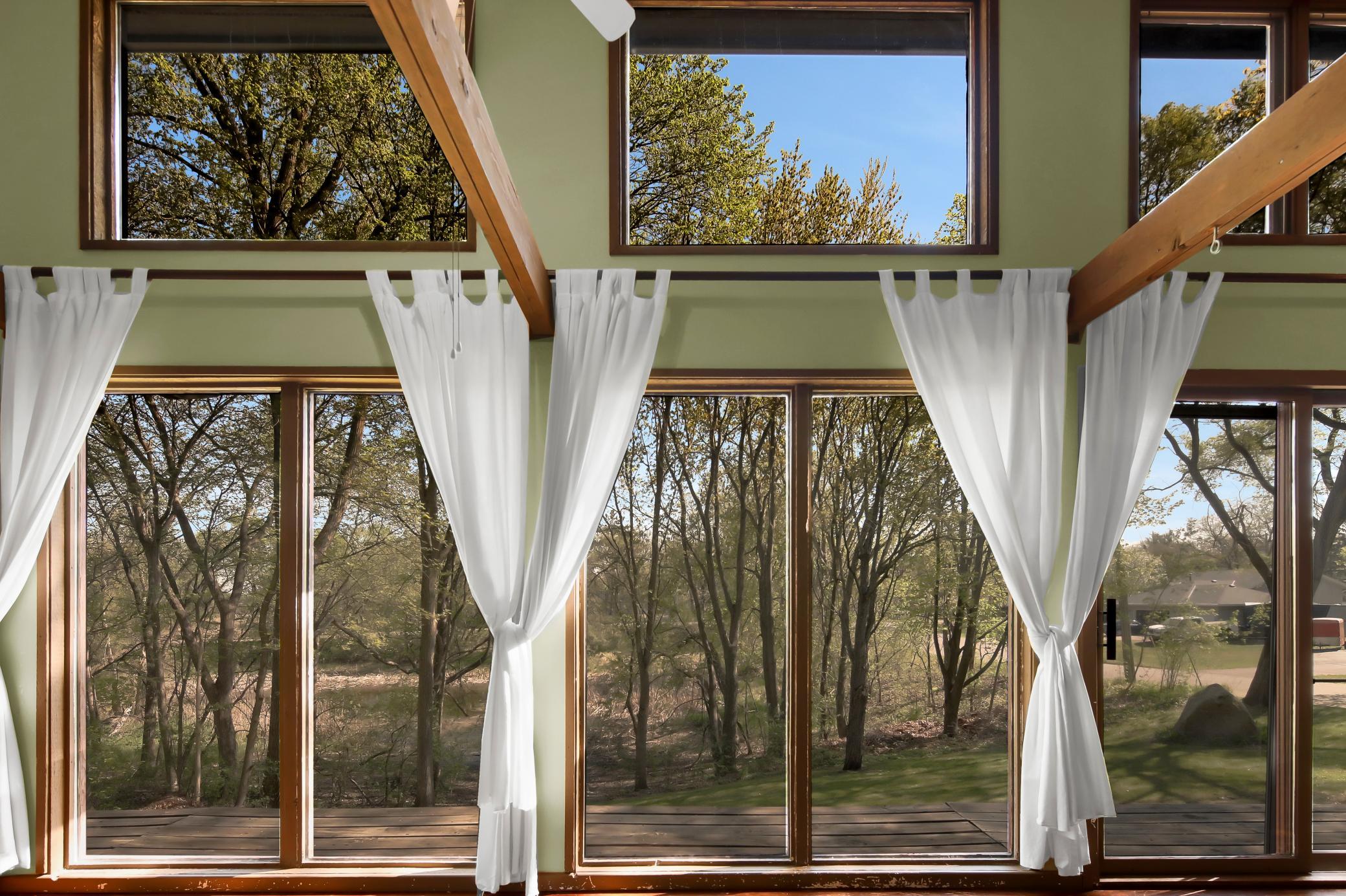 Expansive windows brings nature in.