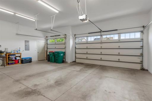 The garage is heated and insulated, and includes an extended third stall.