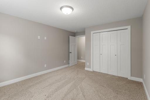 The lower level includes two additional bedrooms.