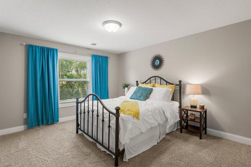 The lower level includes two additional bedrooms.