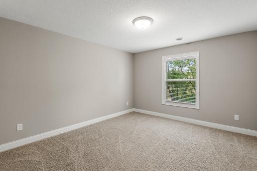 The lower level includes two additional bedrooms.