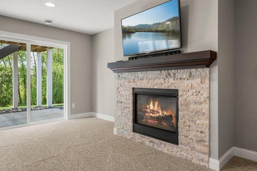 Gather around the fireplace or head out to the backyard.