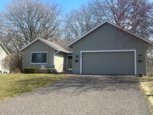 Excellent curb appeal at this home that is set on a wooded lot with no neighbors in the back.